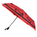 Side view of Dungeons and Dragons red and black umbrella. The D&D logo is at the center of the D20 dice design