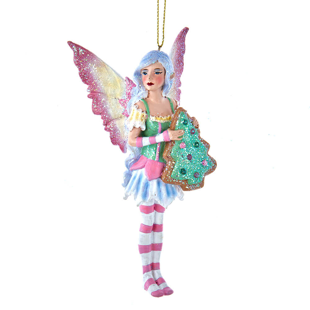 Amy Brown fairy ornament with pixie in pink, green, yellow, blue and white holding a Christmas tree cookie.