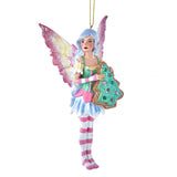 Amy Brown fairy ornament with pixie in pink, green, yellow, blue and white holding a Christmas tree cookie.