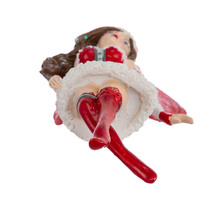 Bottom view of Amy Brown fairy ornament of pixie dressed in red Santa Claus outfit.