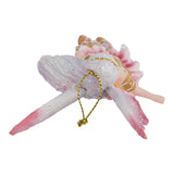 Top down view of Fairy ornament by Amy Brown with pink wings and shirt, brown and purple accents, and a gingerbread man