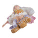 Bottom view of Fairy ornament by Amy Brown with pink wings and shirt, brown and purple accents, and a gingerbread man