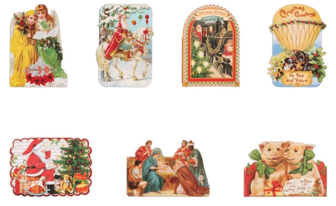 Cards featuring angels, Santa on a horse, Santa on a train, puppies on a hot air balloon, Santa and a tree, the birth of Jesus, and two pigs