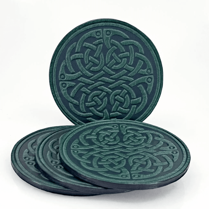 Round Celtic Fish Knot leather coasters, shown in green