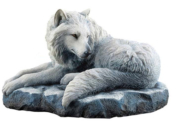 Guardian of the North wolf figurine by Lisa Parker. A white wolf lays on a snowy rock, looking back.