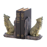 A pair of howling wolves sit on rock as the bookends with two tomes sandwiched between them