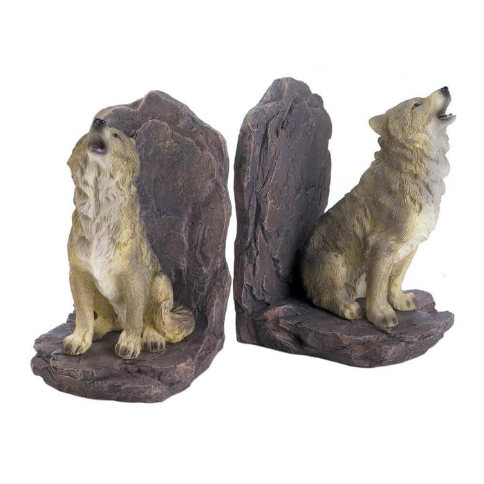 A pair of howling wolves serve as bookends. Each sits on a faux-rock 