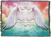 Tapestry blanket with a rainbow sky backdrop and white feathered angel wings. Text reads, "a hug from heaven" with swirl accents