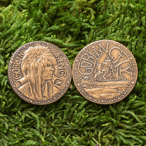 Goblin King coin shown both sides - Jareth on one and the Goblin City on the other, in copper