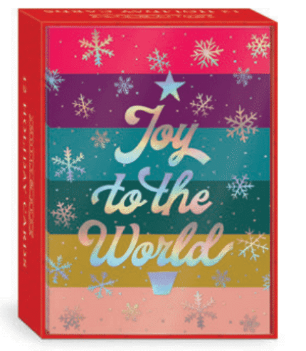 Christmas cards that read "Joy to the World" in the shape of a tree, surrounded by snowflakes on a rainbow stripe background