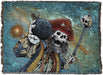 Tapestry blanket showing a skeleton pirate holding a sword with impaled skull, and a bomb.