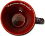 Interior of mug, red with crimson rose at the bottom and title of the art written, "Moon Struck", in white