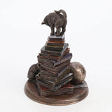 Back of the Moral High Ground figurine showing books and cat