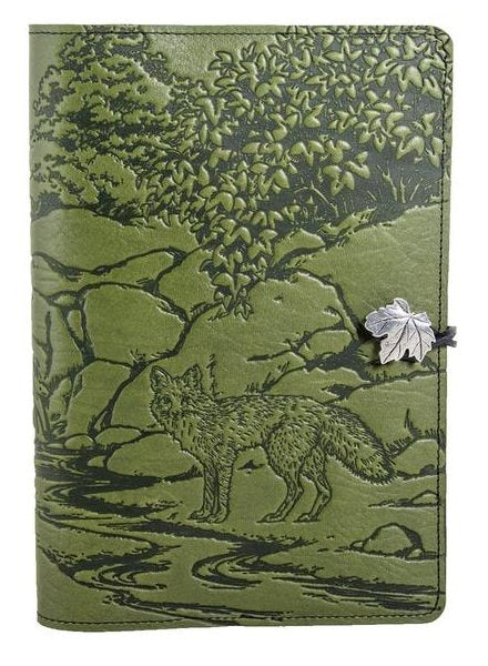 Green leather journal with engraved fox and nature scene, featuring a silver leaf closure.