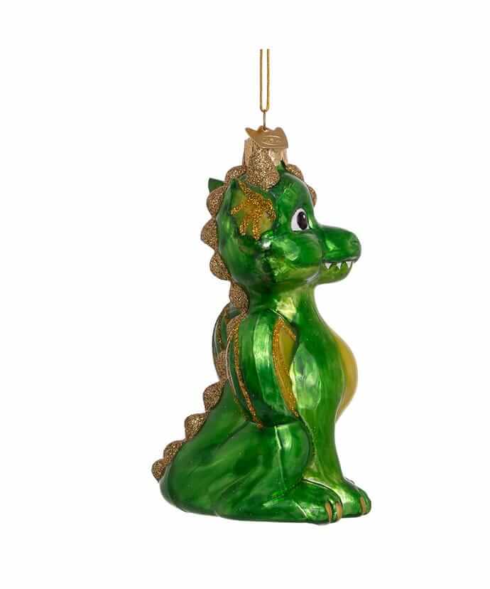 Glass ornament of green baby dragon with glittery accents, shown from side