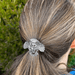 Night Owl ponytail holder shown in use, holding hair in place