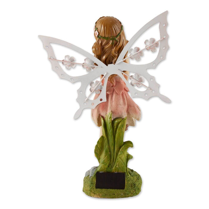 Back of flower fairy figurine showing solar panel