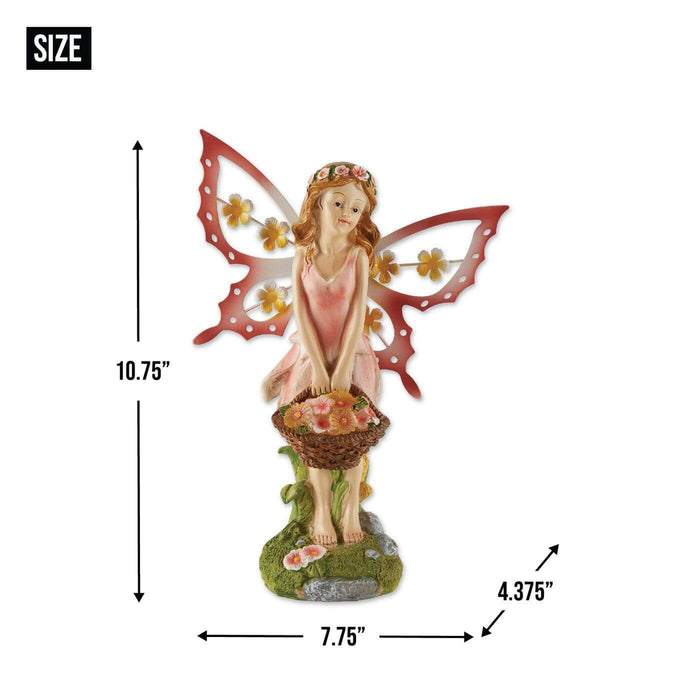 Fairy in a pink dress with basket of flowers that lights up at night. Pink wings with flower accents. Size shown - 10.75 x 7.75 x 4.375"