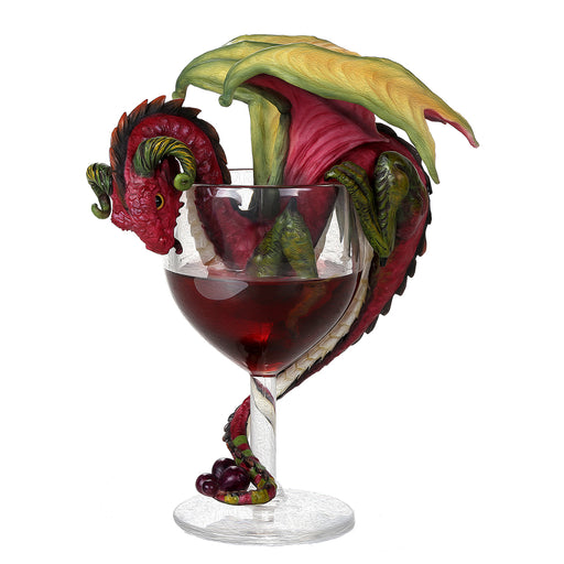 Red dragon with green and yellow wings sitting in a goblet of red wine