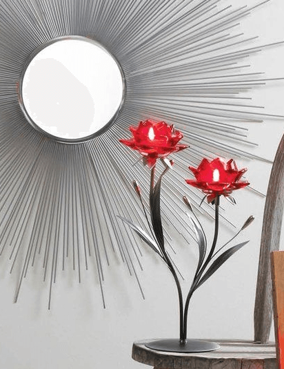 Ref flower tealight holders glow with firelight in a home setting