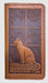 Cat in windowsill leather checkbook cover. Shown in saddle color