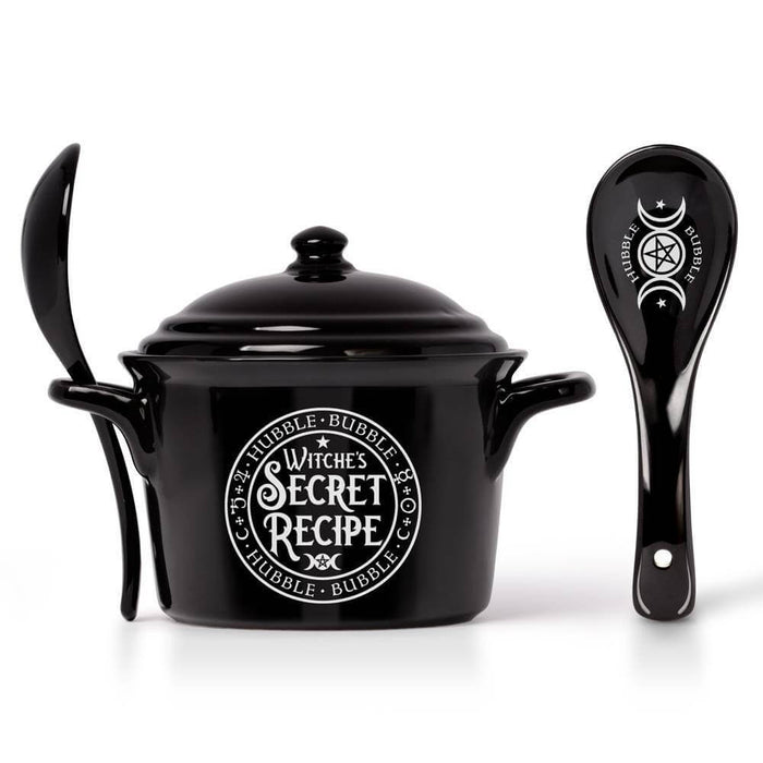 Black soup spot and spoon with "Witches Secret Recipe" upon both