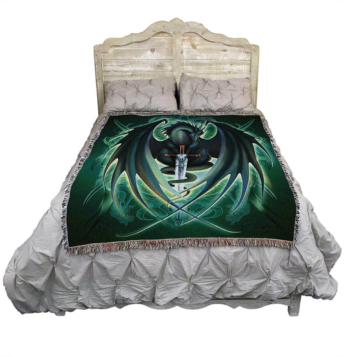 Dragon tapestry blanket displayed laid over a bed