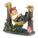 Garden figurine of a gnome sleeping in a hammock