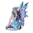 Fairy in bleu with flower accents holding an indigo dragon