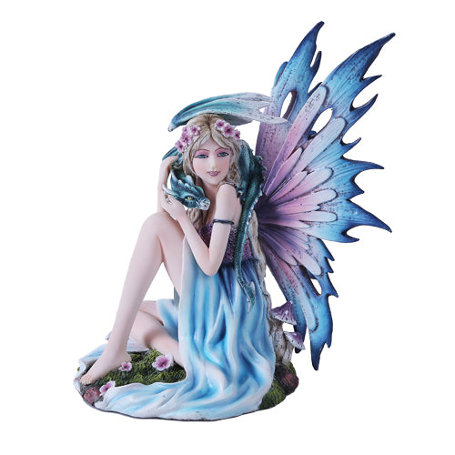 Fairy in bleu with flower accents holding an indigo dragon