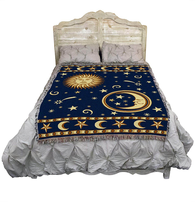Sun and moon tapestry shown on a bed