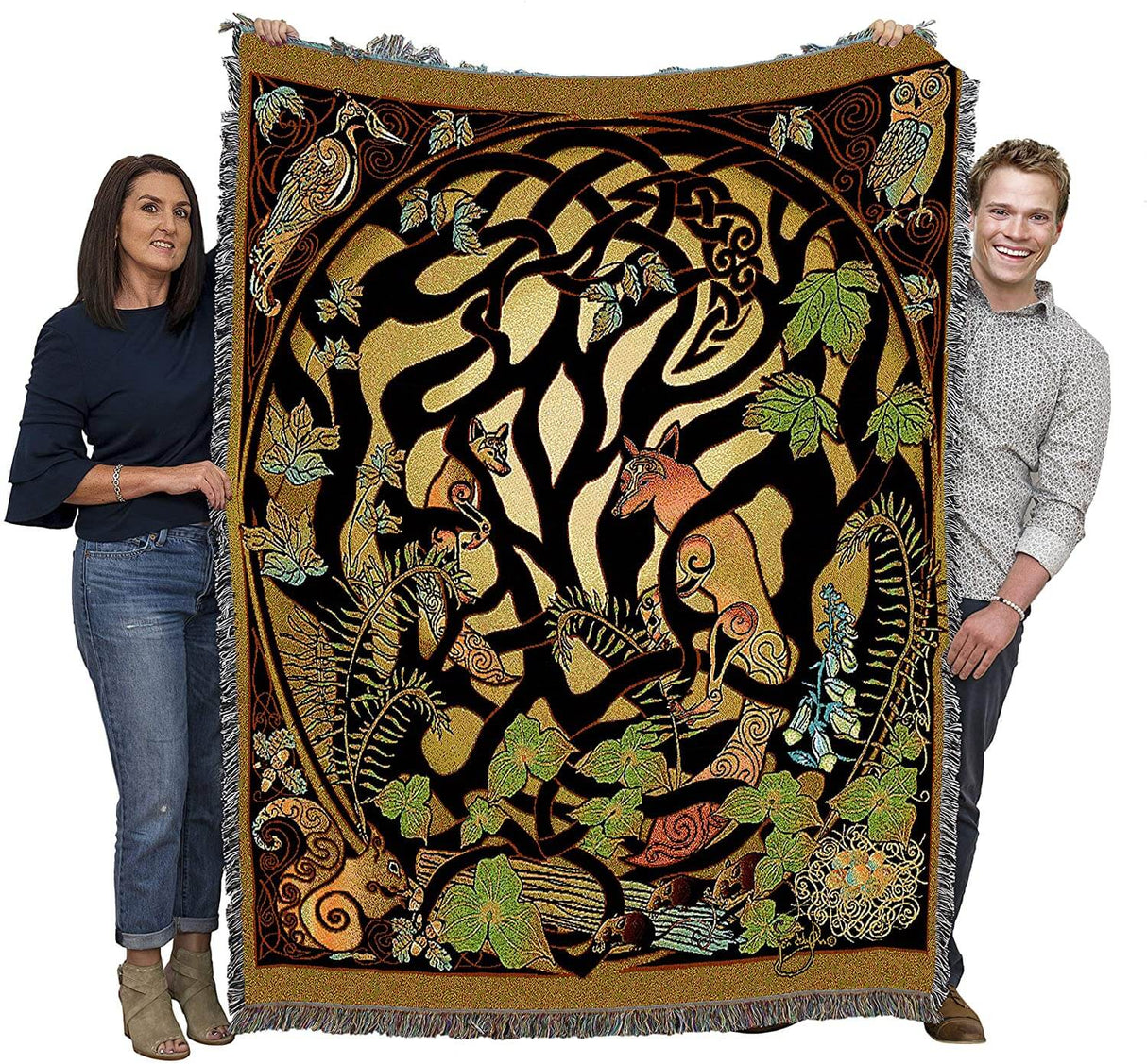 Foxes and woodland animals twine around a Celtic knotwork tree pattern on this tapestry throw blanket. Held up by two adults to show large size