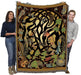 Foxes and woodland animals twine around a Celtic knotwork tree pattern on this tapestry throw blanket. Held up by two adults to show large size