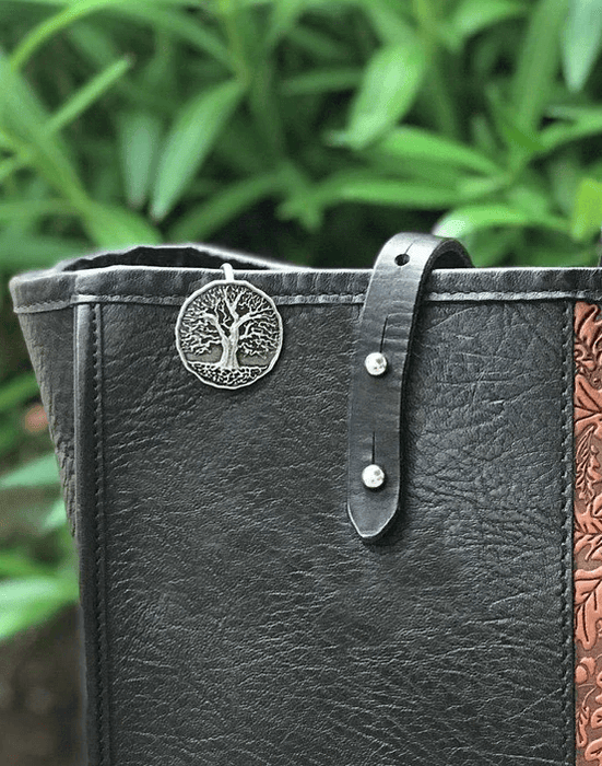 Tree of Life Purse Hook shown on a black leather bag