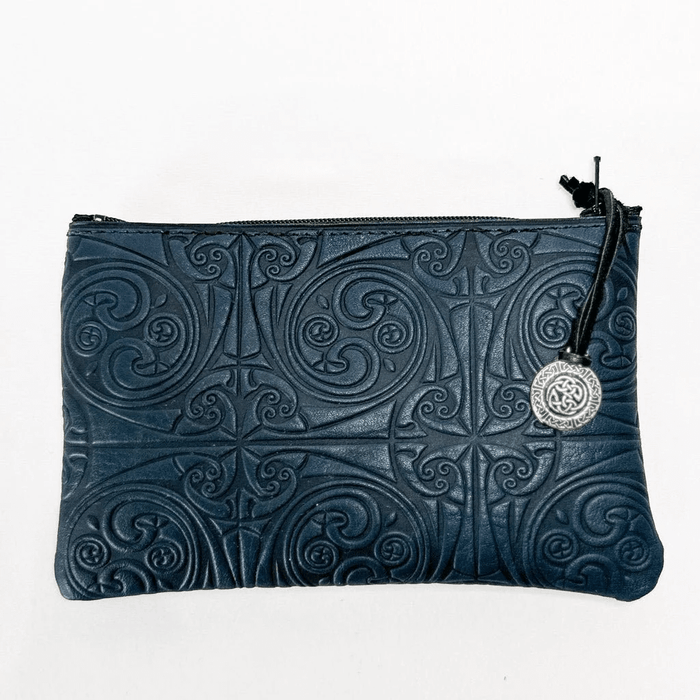 Treskelion leather zipper pouch with Celtic knot design and pewter zipper pull, shown in navy