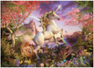 White unicorn rears up, horn glowing. Flowers surround him on the ground and in trees, as well as butterflies. A rainbow arcs across the sky and there is a castle in the background on the mountains.