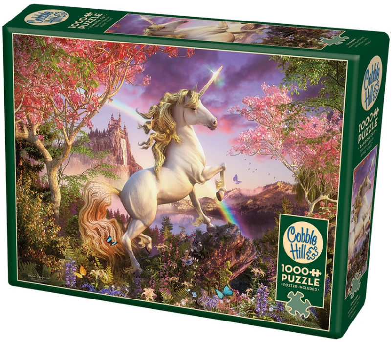 Unicorn jigsaw puzzle, front of box. 1000 pieces. Rearing up white unicorn with glowing horn in front of a floral scene with flowering trees, butterflies, and a castle in the background