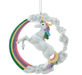 White unicorn with colorful mane and tale rearing up in front of a rainbow with clouds accented in stars