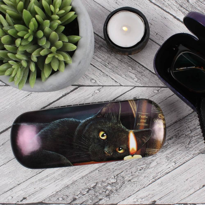 Witching Hour black cat eyeglass case displayed with candle and succulent