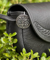 Wildflower purse key hook on a black leather bag