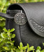 Wildflower purse key hook on a black leather bag