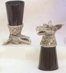 shot glass with a growling wolf made of pewter